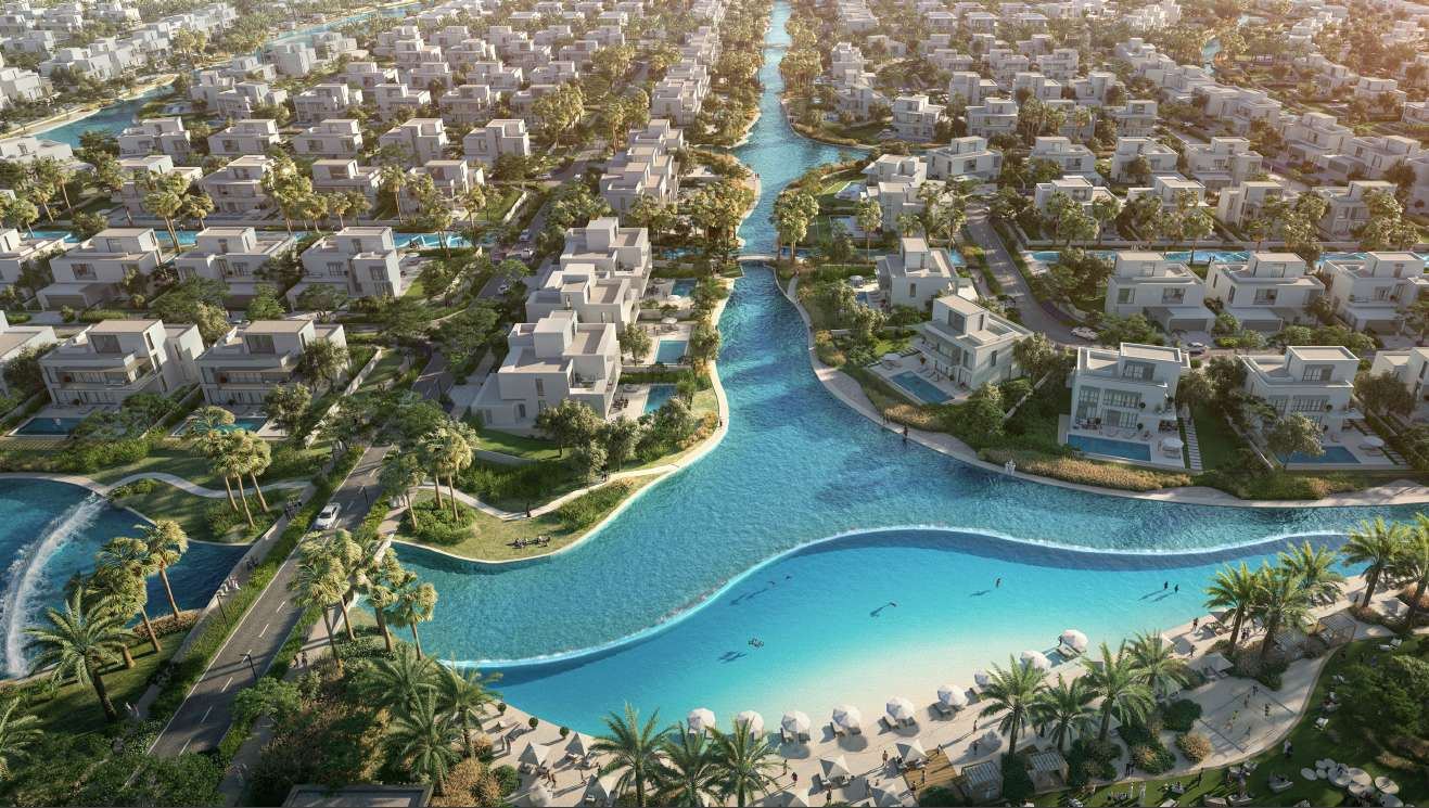 Emaar master community render — low-rise residences and landscaped waterways