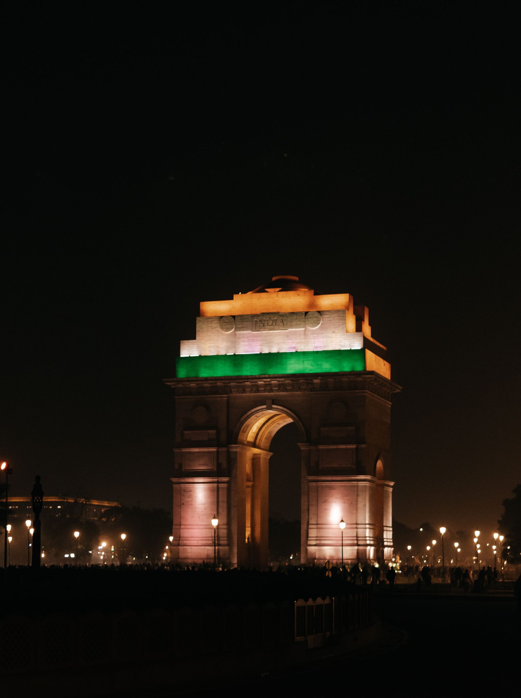 India Gate lit at night, New Delhi — host city of the Better Parker roadshow